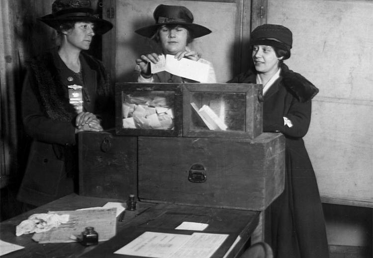 Three suffragists casting votes in New York City, 1917.